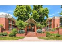A beautiful brick condo complex with lush landscaping and mature trees in a desirable location at 625 Pearl St # 23, Boulder, CO 80302