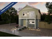 Charming new two-story home featuring modern architectural design and inviting curb appeal in a developing neighborhood at 46538 Avery Ln, Bennett, CO 80022