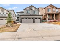 Attractive two-story home with a three-car garage and well-maintained landscaping at 1356 Castle Creek Cir, Castle Rock, CO 80104