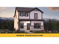 Two story home with dark trim and beautiful mountain views at 814 N Bently St, Watkins, CO 80137