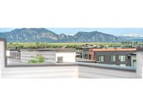Balcony view of Colorado mountains and the surrounding community at 2282 Old Rail Way, Superior, CO 80027