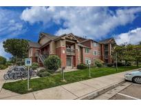 Attractive condo complex boasts maintained landscaping, accessible parking and inviting brick and siding accents at 804 Summer Hawk Dr # 5105, Longmont, CO 80504