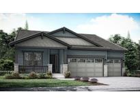 Charming single-story home showcasing a two-car garage and welcoming front porch at 15586 W Beloit Ave, Morrison, CO 80465