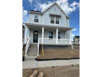 Charming two-story home with a welcoming front porch and classic architectural details at 251 Washington St, Erie, CO 80516