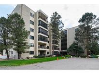 Apartment building featuring well-maintained landscaping and architecture at 13902 E Marina Dr # 303, Aurora, CO 80014