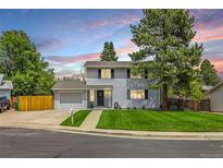 Charming two-story home with a well-manicured front yard and attached garage at 3193 W 134Th Cir, Broomfield, CO 80020