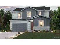Charming two-story home with landscaped yard and a gray-tone exterior at 1350 Loraine N Cir, Lafayette, CO 80026