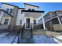 Two-story modern home with gray accents and a covered porch at 22831 E Stanford Ln # A, Aurora, CO 80015