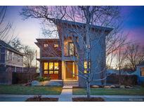 Modern two-story home with unique architectural details and professional landscaping, showcasing curb appeal at 4115 Zenobia St, Denver, CO 80212