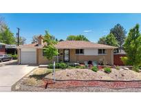 Charming single-story brick home featuring well-maintained landscaping, a front lawn, and a classic design at 8774 Princeton St, Westminster, CO 80031