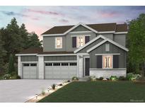 Charming two-story home with gray siding, stone accents, a well-manicured lawn, and three-car garage at 13960 Hanging Lake St, Parker, CO 80138