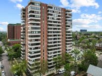 Stunning high-rise condo building featuring multiple balconies and a city view at 130 N Pearl St # 1103, Denver, CO 80203