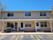 Charming condo exterior featuring well-maintained siding, white trim, and inviting front entrances at 8901 Field St # 81, Broomfield, CO 80021