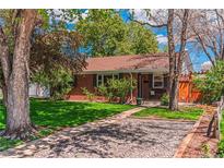 Charming single-story brick home with well-maintained lawn and mature trees at 2274 S Cherry St, Denver, CO 80222