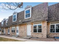 Charming brick townhouse with dormer windows and well-maintained landscaping at 1482 S Pierson St # 75, Lakewood, CO 80232