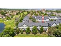 Beautiful townhomes with a lake and golf course creating an idyllic community at 2945 W Riverwalk Cir # B, Littleton, CO 80123