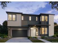 Two-story modern home with attached garage and landscaped front yard at 11491 Alla Breve Cir, Lone Tree, CO 80134