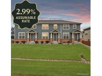 Inviting townhome with a well-manicured lawn and an assumable interest rate of 2.99% at 8237 W 54Th Ave # 2, Arvada, CO 80002