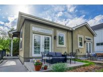 Cozy patio with a charming seating area, perfect for outdoor relaxation and entertaining at 2479 S High St, Denver, CO 80210