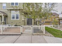 Charming townhome with a fenced front yard and patio, perfect for enjoying the outdoors at 3912 Ute Mountain Trl, Castle Rock, CO 80109