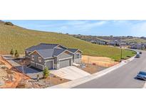 Beautiful single-Gathering home with a two-car garage and mountain views at 4706 Mesa Top Dr, Monument, CO 80132