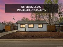 Charming single-story home with fresh exterior paint and a well-maintained front yard at 355 Perry St, Denver, CO 80219