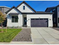 Charming single-Gathering home with a modern farmhouse style, two-car garage, and well-manicured lawn at 5930 S Platte Canyon Dr, Littleton, CO 80123