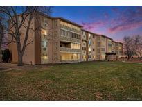 Attractive building exterior at dusk, showcasing landscaping and architecture at 9315 E Center Ave # 3D, Denver, CO 80247