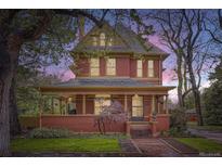 Beautiful home with a classic architectural design and a well-maintained front yard, creating a welcoming curb appeal at 835 Niagara St, Denver, CO 80220