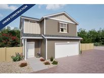 Charming two-story home with an attached garage, neutral siding, and inviting front yard landscaping at 46541 Sunflower Ln, Bennett, CO 80102