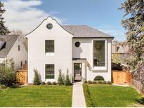 Striking modern exterior with unique architectural details and manicured front yard at 535 Albion St, Denver, CO 80220