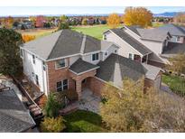 Aerial view of the home showcasing its architectural details and lush landscaping at 4340 Nelson Dr, Broomfield, CO 80023