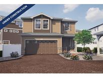 Under construction two story home with tan siding, brick driveway, and well manicured front yard at 1175 Highview Dr, Erie, CO 80516