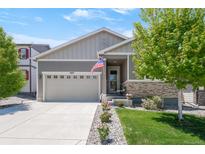 Charming single-Gathering home featuring a well-maintained lawn and attached two-car garage at 4635 S Odessa St, Centennial, CO 80015