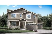 Charming two-story home features a two-car garage and well-manicured lawn at 4003 Descent St, Castle Rock, CO 80108