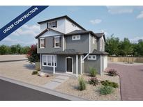 Charming two-story home with gray siding, white trim, and a covered front porch at 46521 Sunflower Ln, Bennett, CO 80102