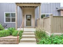 Front entrance with stairs, landscaping, and a covered porch at 4137 Clifton Ct, Boulder, CO 80301