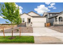 Charming single-Gathering home with a two-car garage and newly landscaped front yard at 11124 Xanadu St, Commerce City, CO 80022