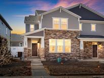 Charming home with stone accents at 22415 E 7Th Pl, Aurora, CO 80018