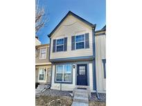 Charming two-story townhouse with blue trim and a welcoming front entrance at 1652 S Idalia Cir # C, Aurora, CO 80017