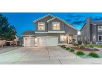 Charming two-story home with a three-car garage and well-maintained landscaping at 17050 Park Trail Dr, Monument, CO 80132