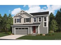 Two-story home featuring gray siding, a gabled roof, a two-car garage, and a neatly manicured front lawn at 4589 Thistle Dr, Brighton, CO 80601