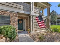 Charming home exterior featuring stone accents and a welcoming entrance at 4385 S Balsam St # 10-103, Littleton, CO 80123