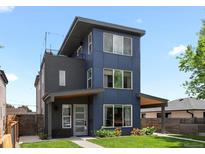 Modern home featuring a multi-level design and a rooftop deck at 1568 Wolff St, Denver, CO 80204