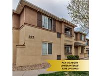 Attractive condo complex featuring earth-tone stucco, dark shutters and cozy second story terraces at 837 E 98Th Ave # 403, Thornton, CO 80229