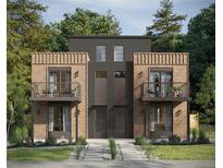 Modern townhome with brick accents, second-story balconies, and professionally landscaped front yard at 4512 Utica St, Denver, CO 80212