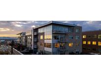 Modern multi-unit building with city views at sunset at 1411 Wynkoop St # 806, Denver, CO 80202