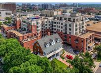 Stunning aerial view showcasing the unique architecture and inviting outdoor spaces of this desirable residence and community at 410 Acoma St # 518, Denver, CO 80204