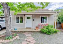 Charming home featuring a cozy front porch and delightful curb appeal at 737 La Farge Ave, Louisville, CO 80027