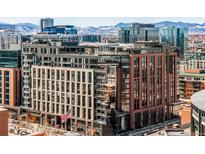 Modern building showcasing urban living with mountain views in the background at 1901 Wazee St # 304, Denver, CO 80202